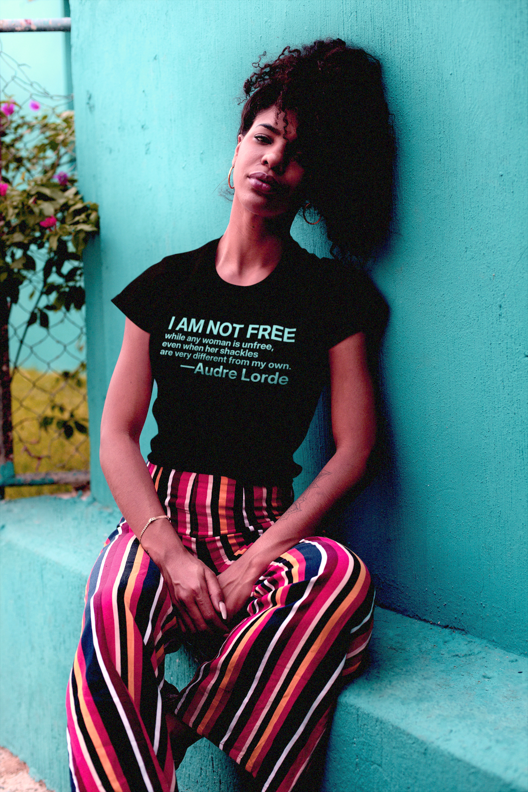 Audre Lorde: I am not free while any woman is unfree ... Relaxed Fit Women's Tee | 5 graphic colors available