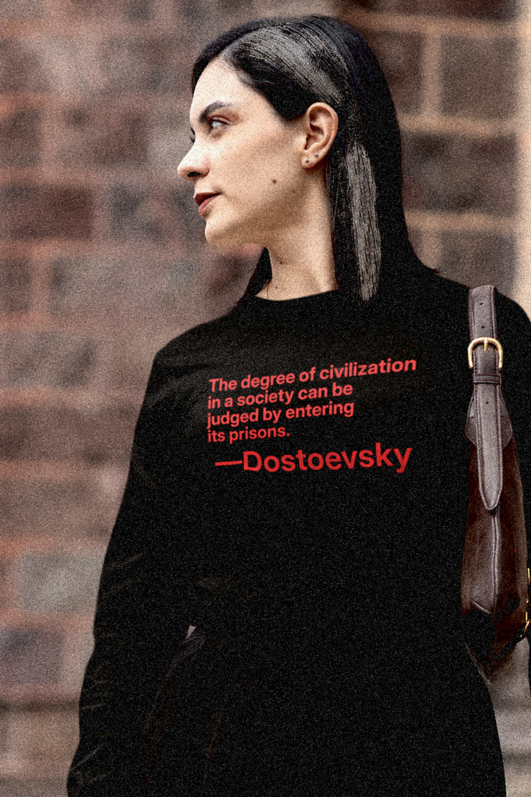 Gothesque female law student on steps walking across campus wearing a Quality Long Sleeve Jersey the Dostoevsky quote “The degree of civilization in a society can be judged by entering its prisons.” - Fyodor Dostoevsky. Great gift for reformers. Cotton Bella+Canvas 3501 #EUTC