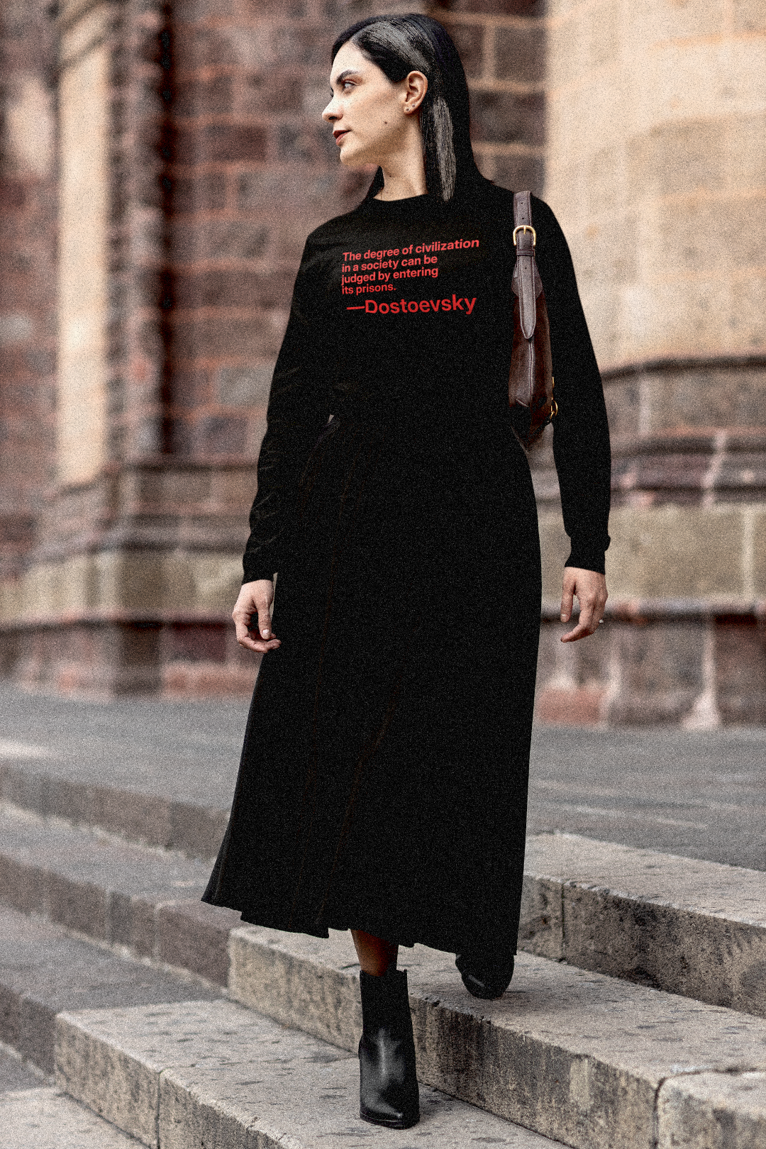 Gothesque female law student on steps walking across campus wearing a Quality Long Sleeve Jersey the Dostoevsky quote “The degree of civilization in a society can be judged by entering its prisons.” - Fyodor Dostoevsky. Great gift for reformers. Cotton Bella+Canvas 3501 #EUTC
