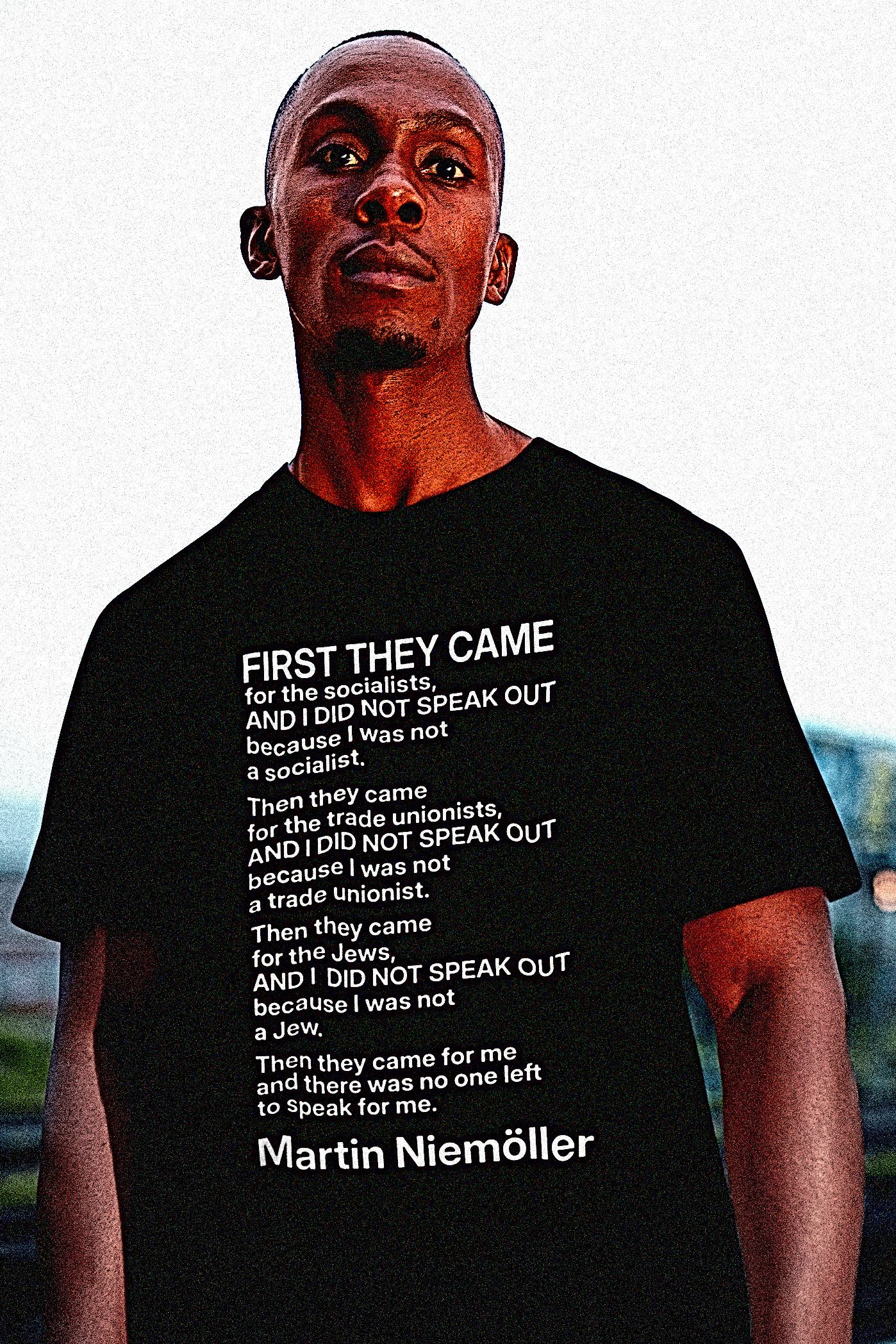 Defiant young Black man on a industrial roof wearing a Basic Black T-Shirt with Martin Niemöller — “First They Came” poem:
German pastor Martin Niemöller (1892–1984) penned his haunting confession “First They Came” after witnessing the rise of Nazism and his own silence during its early years. First they came for the Socialists
And I did not speak out
Because I was not a Socialist
Then they came for the trade unionists
And I did not speak out
Because I was not a trade unionist
Then they came for the Jews
