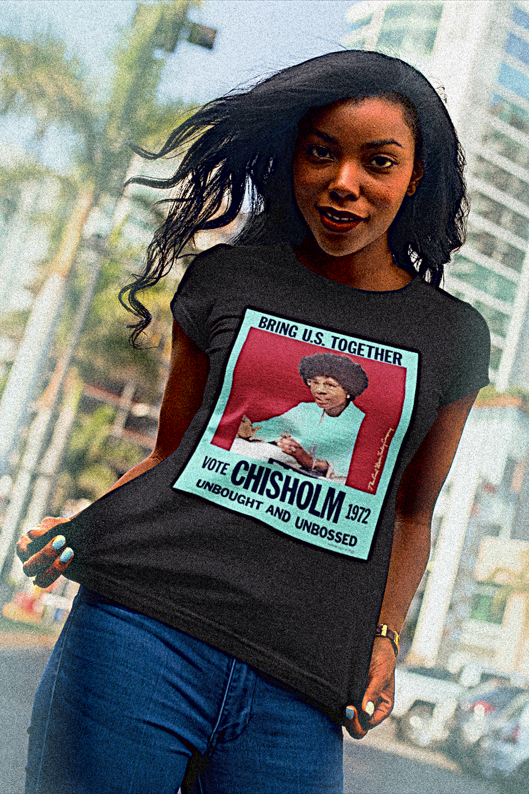 Trim Black woman showing off her Black Relaxed Fit Womens T-Shirt:  Shirley Chisholm was “unbought and unbossed,” the first Black woman elected to Congress and the first to run for president in a major party. She smashed through the double barriers of race and gender, and she did it without asking permission. The perfect gift for the feminist budding political junkie in your life. Cotton Bella+Canvas 6400 #EUTC