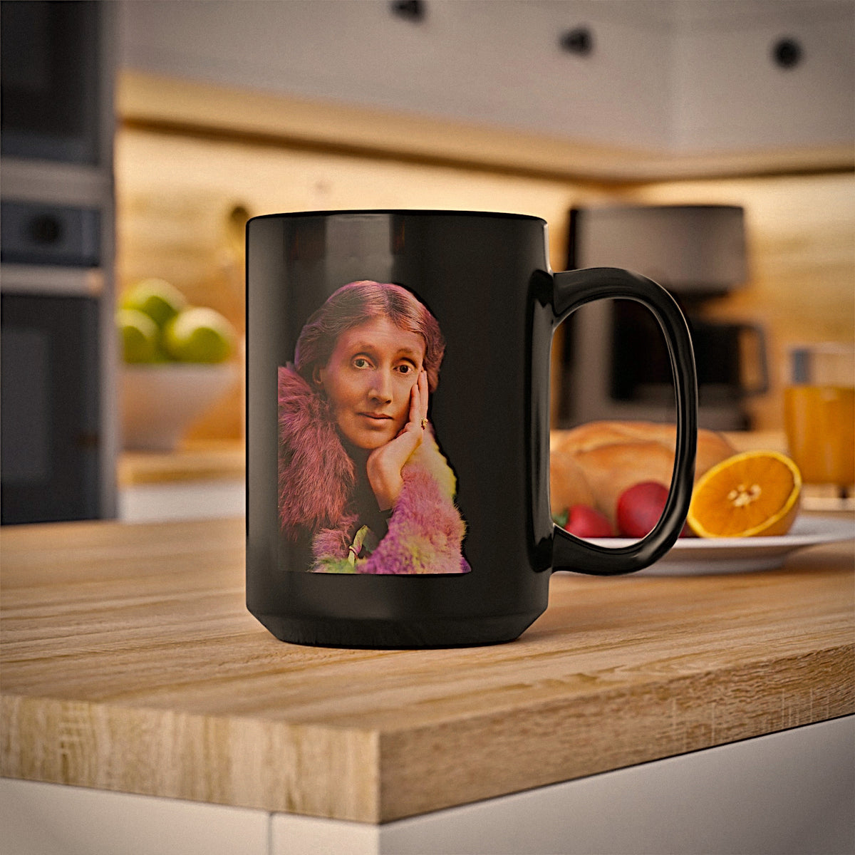 Virginia Woolf mug with colorized portrait on a butcher block kitchen island. 